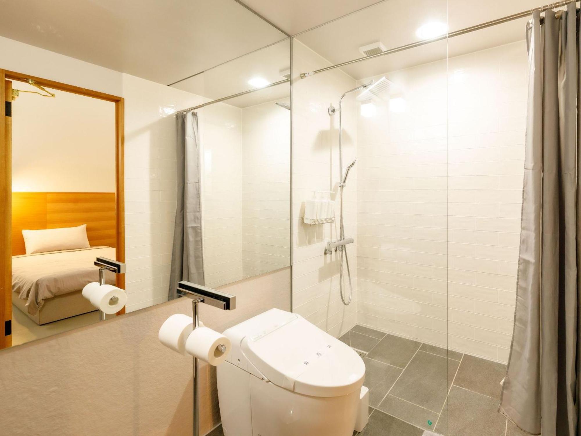 Denpaku Akakina Hotel Amami Habitación foto